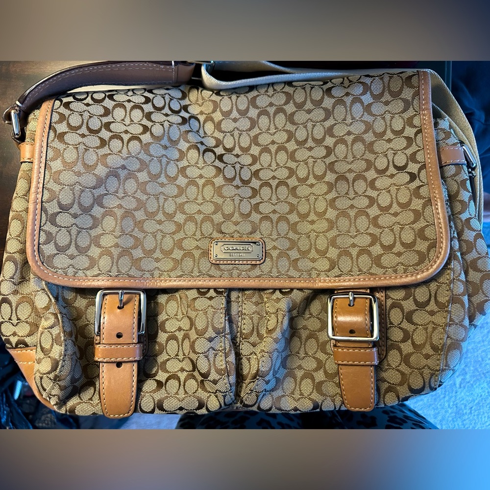 Coach shoulder bag with multiple pockets and zipper pocket. Great condition.
